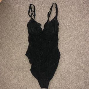 La Perla black bodysuit with rose design